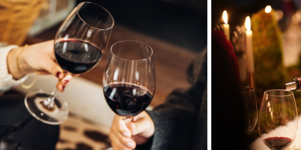 Copas de vino tinto brindando durante una degustación de vino de OportoVino de Oporto servido en copa durante una cena 