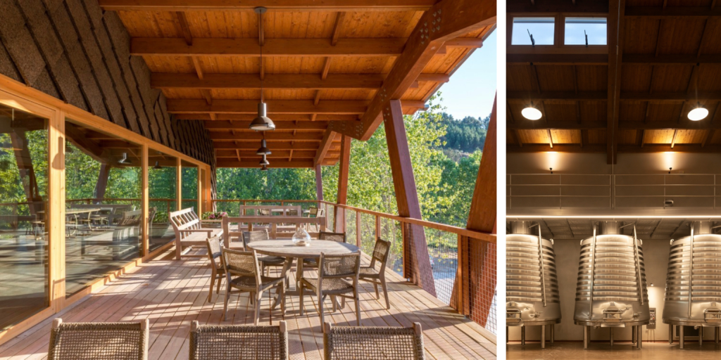 Interior de bodega en el Dão con grandes ventanales y vistas a los viñedosTerraza de bodega en el Dão con mesa y vistas al paisaje
